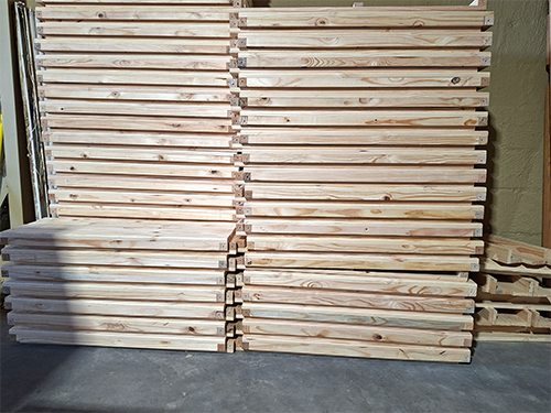 Namzam Timbers loading wood supply onto truck trailer